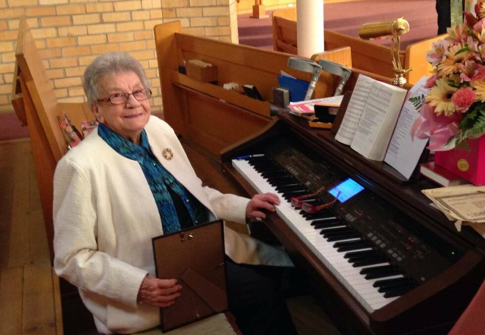 ON KEY: Dawn Dalkin at the organ that she played in St Andrews Uniting Church for more than 30 years. Picture: FILE