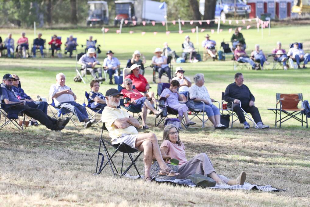 RELAX: Spectators take in the Brass on the Grass event on the ninth fairway at the Beaufort Golf and Bowls Club on Sunday.