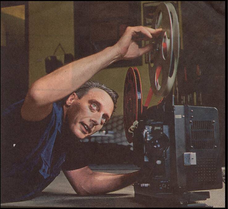 RESEARCH. UFO Research NSW vice president Jaimie Leonarder lacing a 16mm film projector- analysing UFO footage. Picture: Mu-Meson Archives