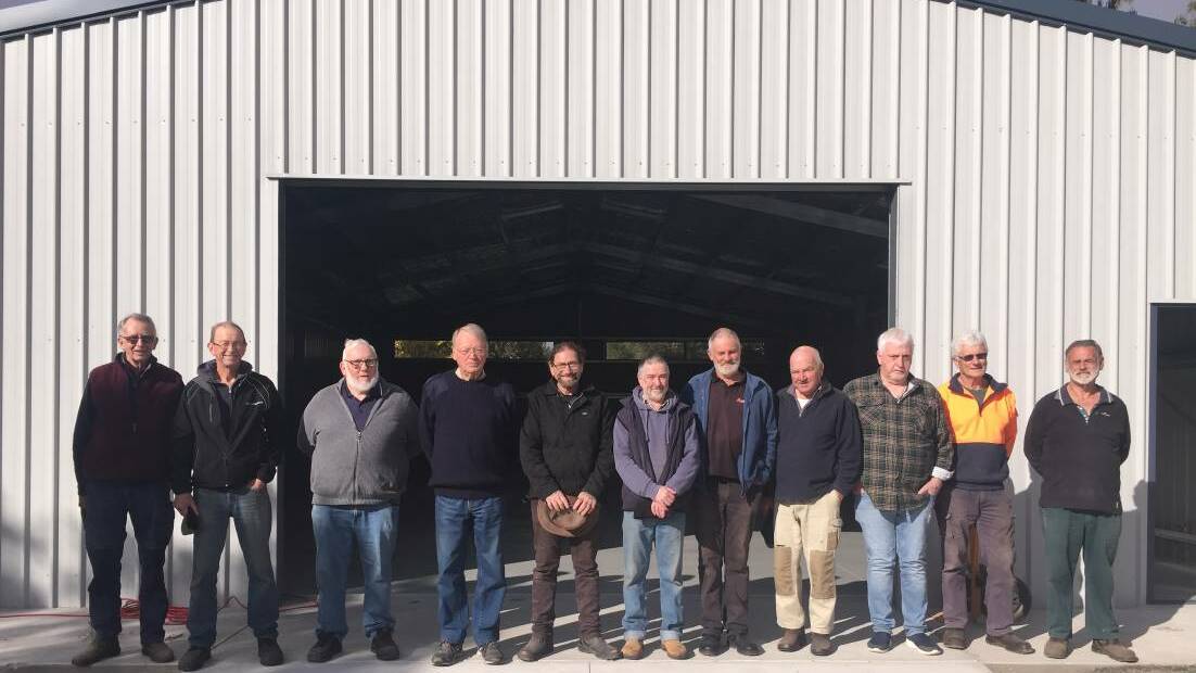 UPGRADE: Pomonal Men's Shed members Trevor Newell, Rob Porter, Chris Huggins, Barry Colyer, Russ Kellett, Paul Granger, Stuart Thorpe, Wayne Farey, Ian Ivey, Phill Bennett, and Paul Shelley at the entrance of their new shed. Picture: KLAUS NANNESTAD