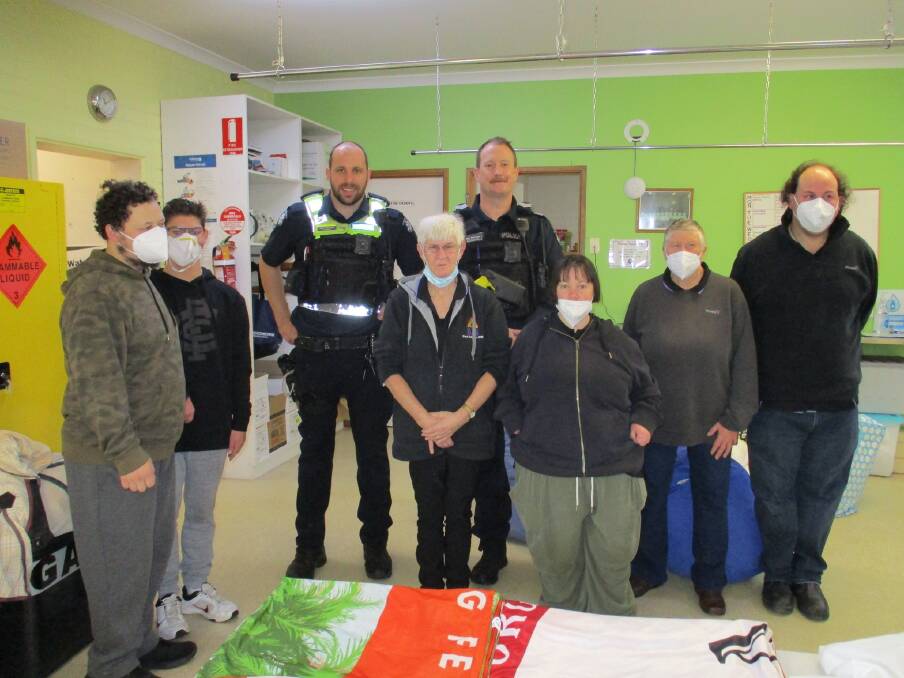 VISIT: Ararat Police at Pinnacle Commercial Laundry. Picture: CONTRIBUTED. 