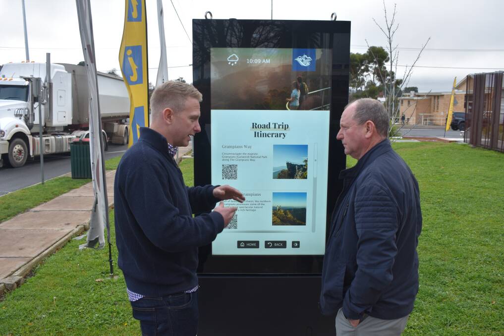 ACTIVATED: Ararat City Council's Tim McDougall and Ararat deputy mayor Cr Bob Sanders at the digital sign at the visitor centre. Picture: JAMES HALLETY. 
