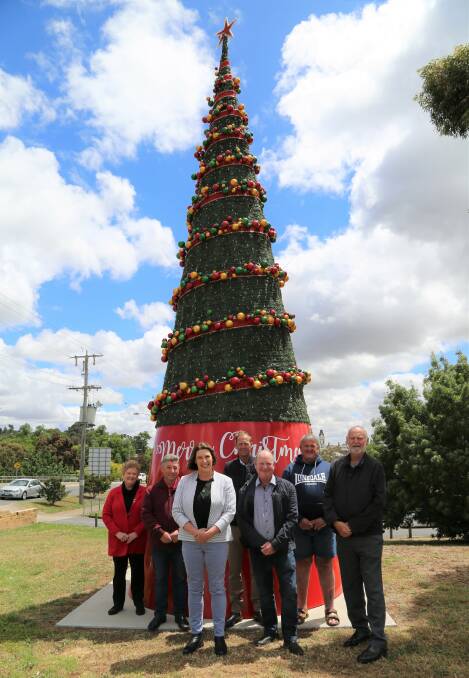 FESTIVE SEASON: The Ararat Council at one of the many Christmas trees in town. Picture: CONTRIBUTED.