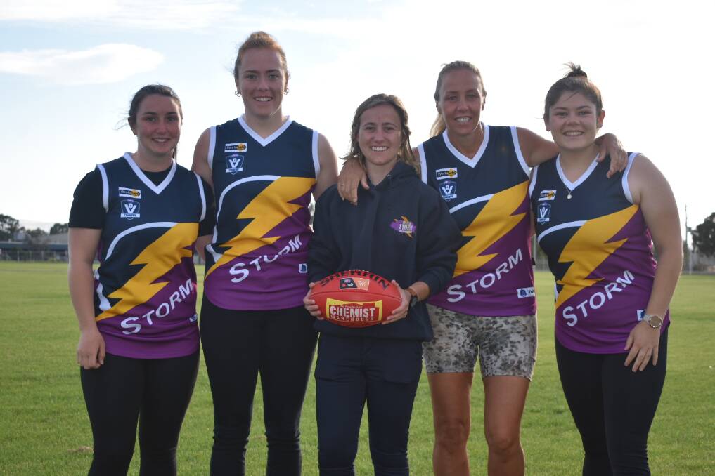KEEN: Chelsea Wilson, Jess Kirkpatrick, coach Rebecca Phillips, Jess Humphries and Briana Close are excited to return to training. 