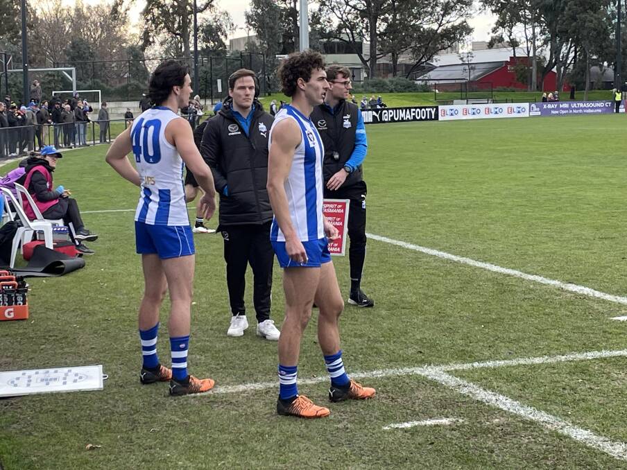 NEW: Ararat's Tom Williamson waiting to get onto the field along side AFL listed players Eddie Ford and Jared Polec. Picture: JAMES HALLEY