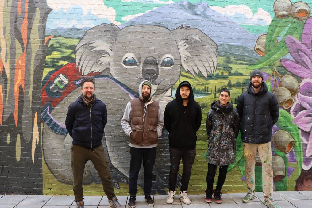 HARD WORK: Artists Conrad Bizjak, Christian Veins, Tayla Broekman, Camilo Refuz and led by Mike Makatron. Picture: CONTRIBUTED