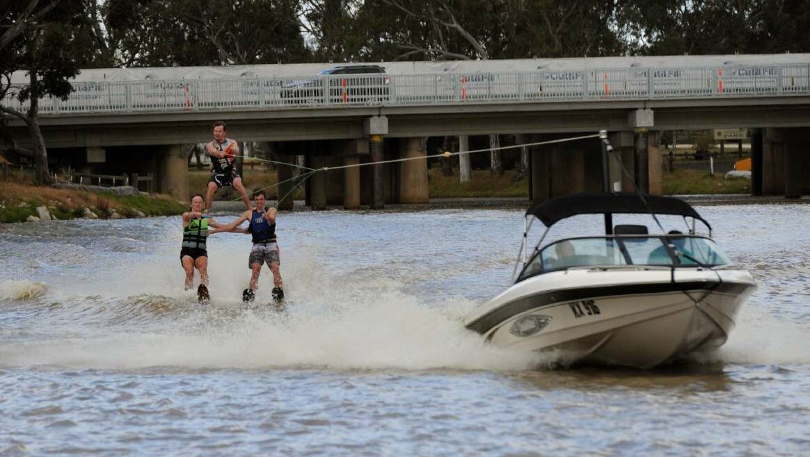 Rhona Conboy, Nick Hinch and Alex Cameron of the Natimuk Lake Ski Club on Wimmera River for the 2013 Kannamaroo festival.