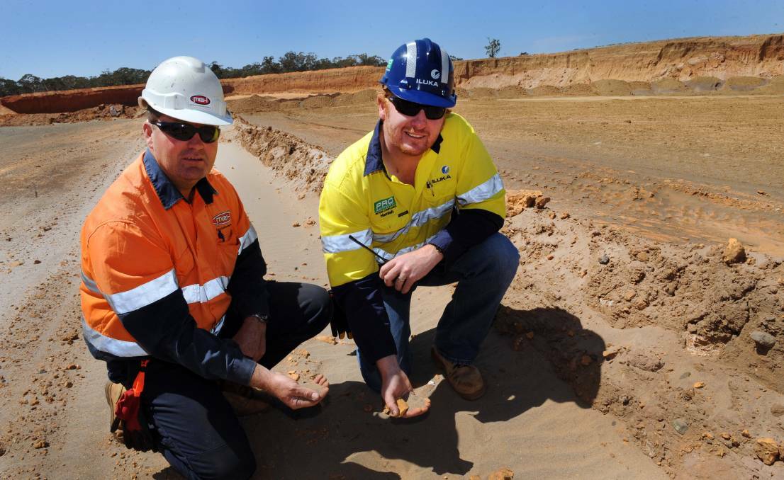 Contractor Heath McClure and Hamish Little at Iluka's mine at Douglas.
