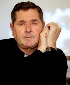 Father Chris Riley. 