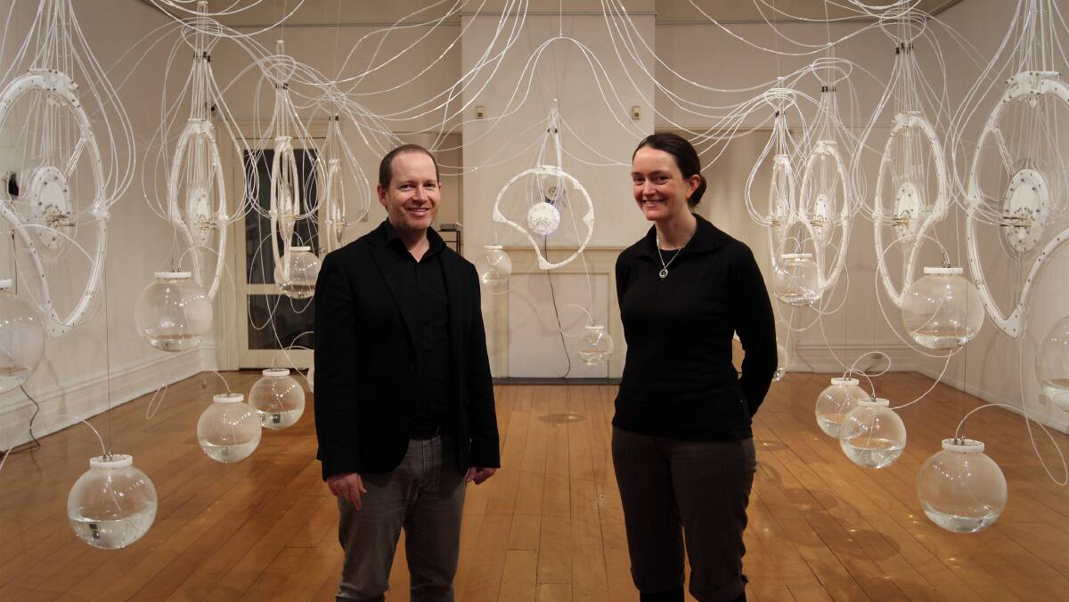 Ararat Regional Art Gallery director Anthony Camm is pictured with artist, Laura Woodward at her 'Writhe' exhibition. 