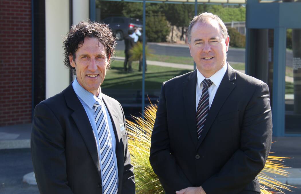 REAPPOINTED: East Grampians Health Service chief executive Nick Bush will serve another five-year term. He is pictured with board president Matthew Wood.