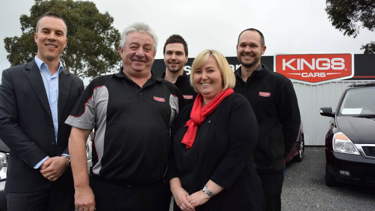 BIG BENEFITS: Kings Cars has gained work from construction of the Ararat Wind Farm. Manager Michael Smith is pictured with staff John Robinson, Ash Morris, Natalie Coghlan and John Grayling. Picture: BEN KIMBER.