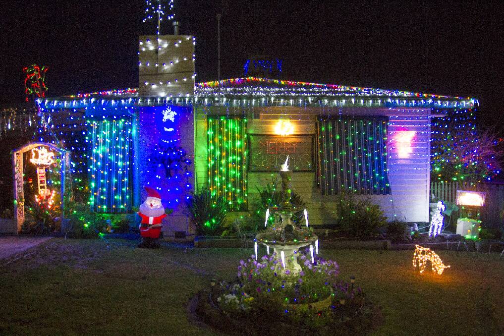 LIGHTING UP: This home in Churchill Avenue took out the title of ‘Overall Best House’ in the 2014 Rotary Club of Ararat Christmas Lights Competition.