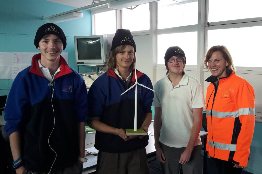 ENERGISED: Ararat College students Jacob Holmes, Jack Sanders and Kaydan Monro with Ararat Wind Farm communications manager Tanya Jackson. Picture: CONTRIBUTED