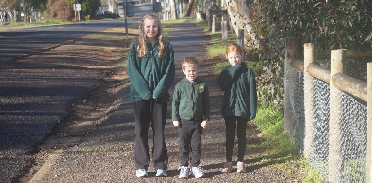 READY TO WALK: Pomonal pupils Annie Dalkin, Dusty Weathers and Marnie Dickinson are preparing for Walk to School month in October.