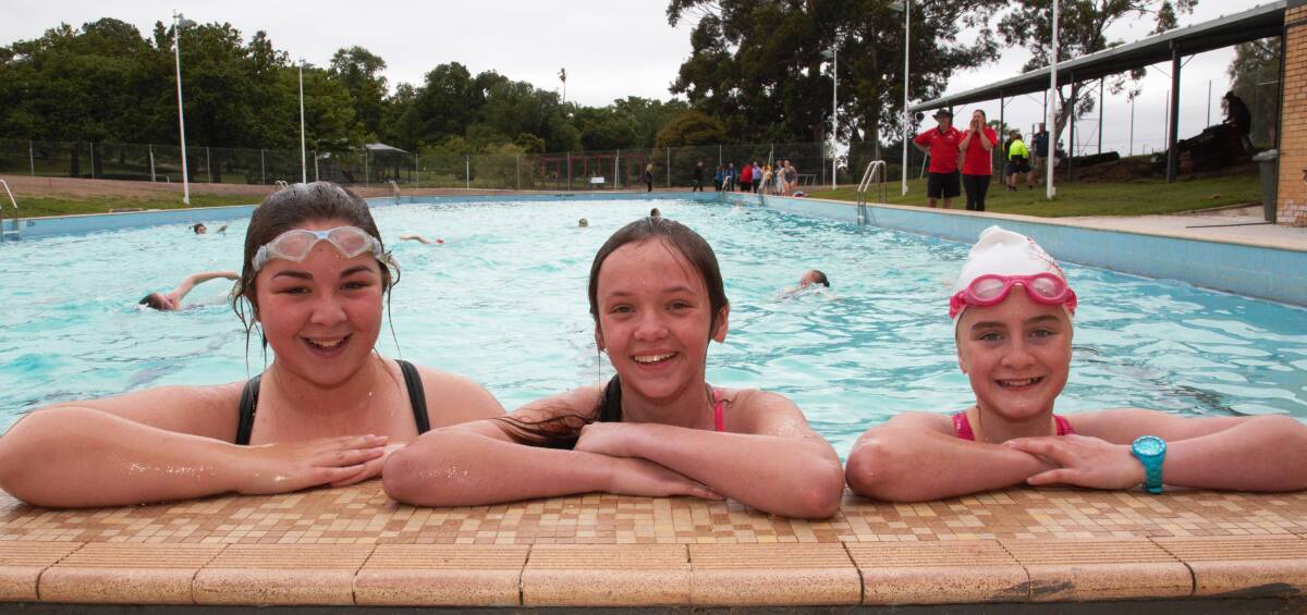 OPEN: Layla Dale, Charlotte Walker and Ella McLoughlin get used to the new Ararat Outdoor Olympic Pool on Wednesday. Picture: Peter Pickering