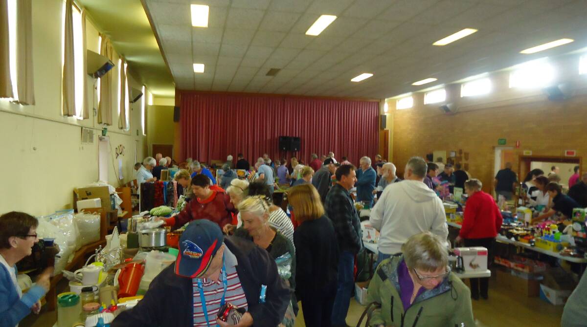 KEEN SHOPPERS: A large crowd turned out to snap up bargains and cheap items at the Ararat Uniting Church fair on Saturday. Picture: CONTRIBUTED