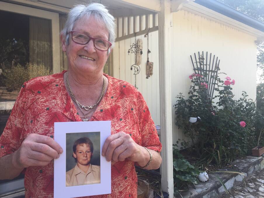 SHOCKED: Helen Watson, with a photo of her son Peter, is disgusted the new parish in south-west Victoria has been named after a place in the US where Paul David Ryan is facing charges.