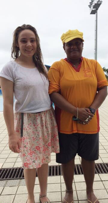 Phoebe Brady with Fijian swimming teacher Siteri. Phoebe spent time with students form Basden College, Suva, teaching them swimming and survival skills.