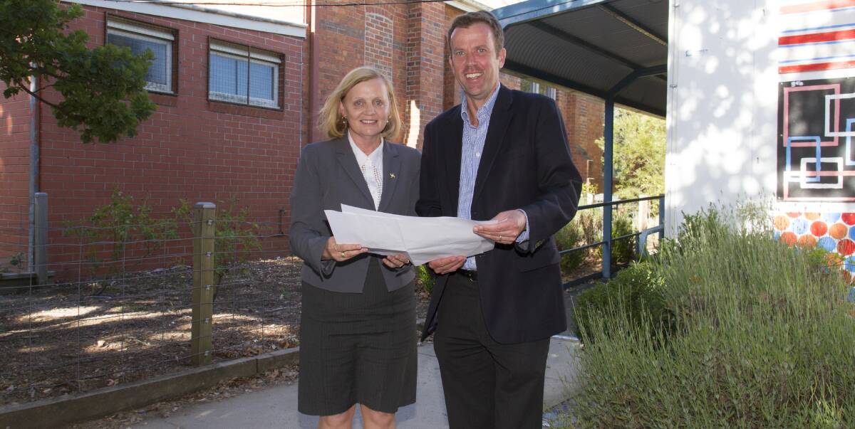 MILESTONE: Marian College principal Carmel Barker and Member for Wannon Dan Tehan look over plans for a $1.6 million construction project at the school. Picture: PETER PICKERING
