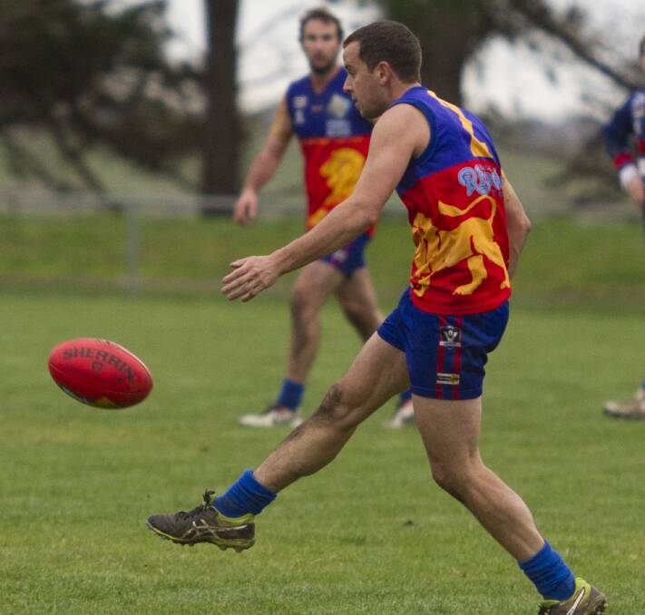 BOOT TO BALL: Adam McGaffin was one of the key players in Great Western Lion's win over Caramut Swans on Saturday. Pictures: PETER PICKERING