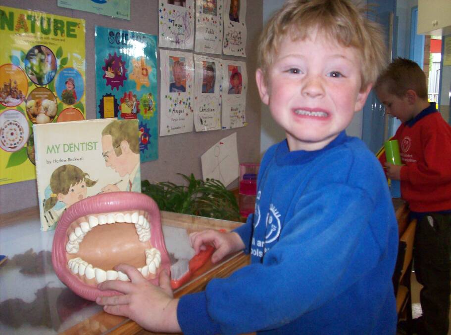 SIMLES 4 MILES: Noah from Marrang Kindergarten practices how to brush his teeth. Picture: CONTRIBUTED
