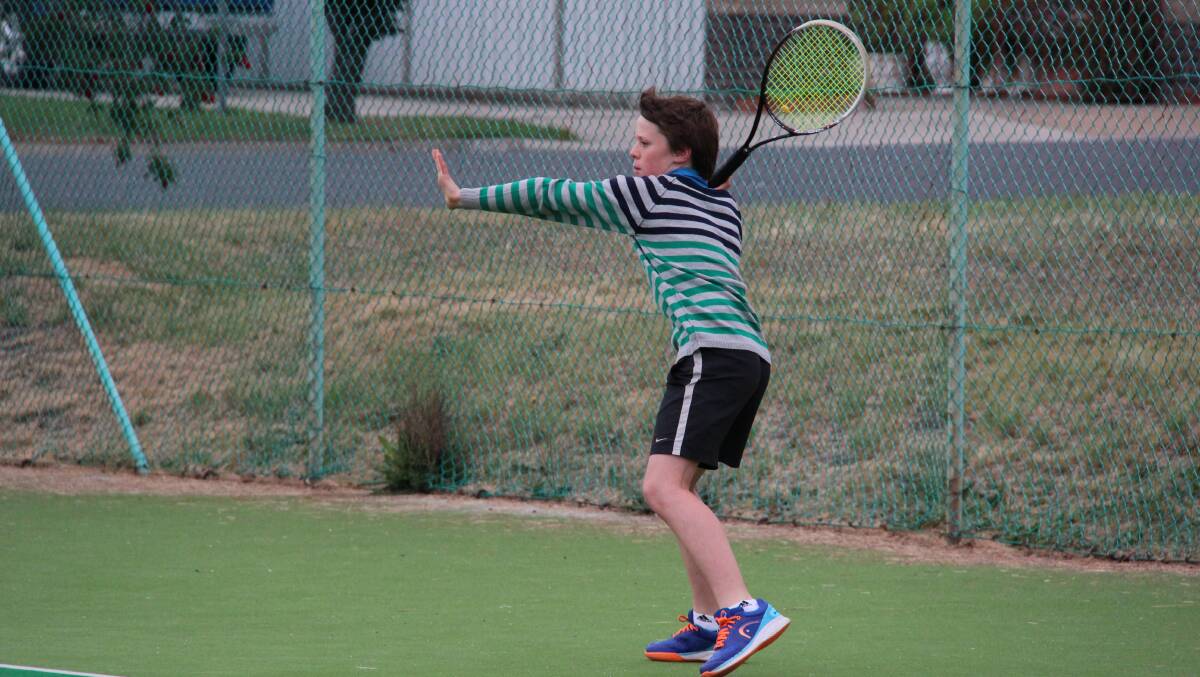 ATTACKING: Ed Bush sets up for a forehand. Bush played a crucial role in seeing Fosters Mensland across the line. Picture: CONTRIBUTED