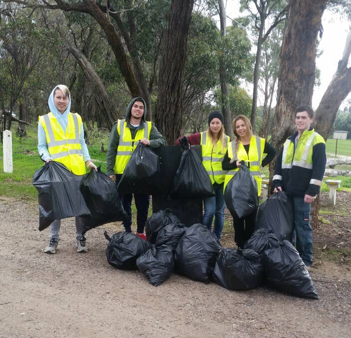 ABSOLUTE RUBBISH: Ararat's Jon Ross, Jovit Conilla, Kate Kelly, Cassie Jaensch and Jacob Weeks attempted to clean up a section of the Western Highway last month. Picture: CONTRIBUTED  