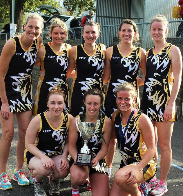 Mininera's senior interleague netballers with their spoils: GS - Peta Byrne and Sarah Cameron, GA - Jessica Cameron, WA - Nicole Anderson, C - Emma Smith, WD - Meagan forth, GD - Kate Reynolds, GK - Georgia Muir. Jessica Cameron coached and captained the team. Pictures: CHLOE BROWN  