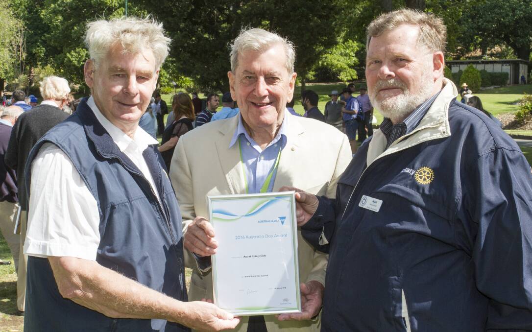 Rotarians Morrie Allgood (left) and Ron McCormick (right) with Australia Day Ambassador, Don Hyde. Picture: PETER PICKERING 