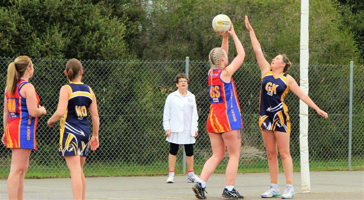Hawkesdale-Macarthur's Dejay Buchanan defends Great Western shooter Mollie Simpson on Saturday. Picture: CONTRIBUTED 