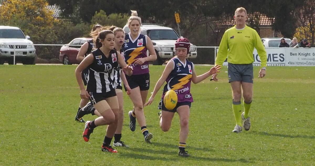 YOU CAN'T CATCH ME: Ararat Storm's Lilly Dowling makes a run for it last weekend against Darley. Storm defeated Darley by 21 points in the elimination final. Picture: CONTRIBUTED 
