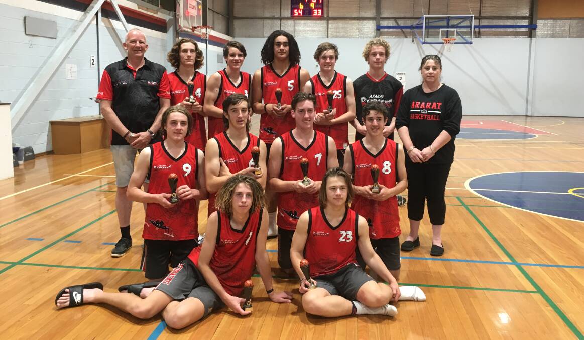WINNERS: The victorious Redbacks under-18 division one boys team with coach Steve Cronin and team manager Casanda Woods after the Horsham Junior Classic.