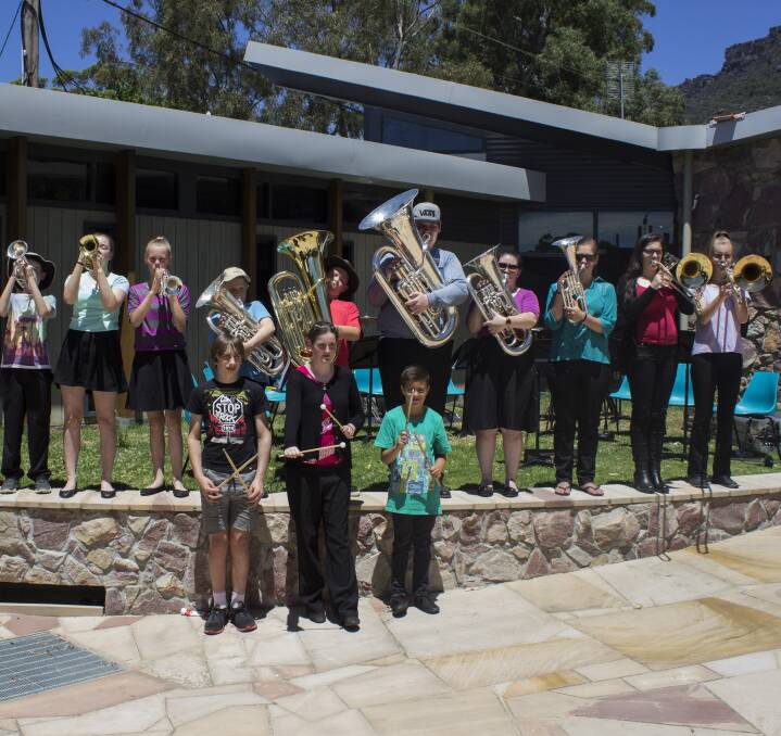 TUNED: The Grampians Youth Brass Band assembled with their instruments in Halls Gap on Tuesday. Pictures: Sandra Pope
