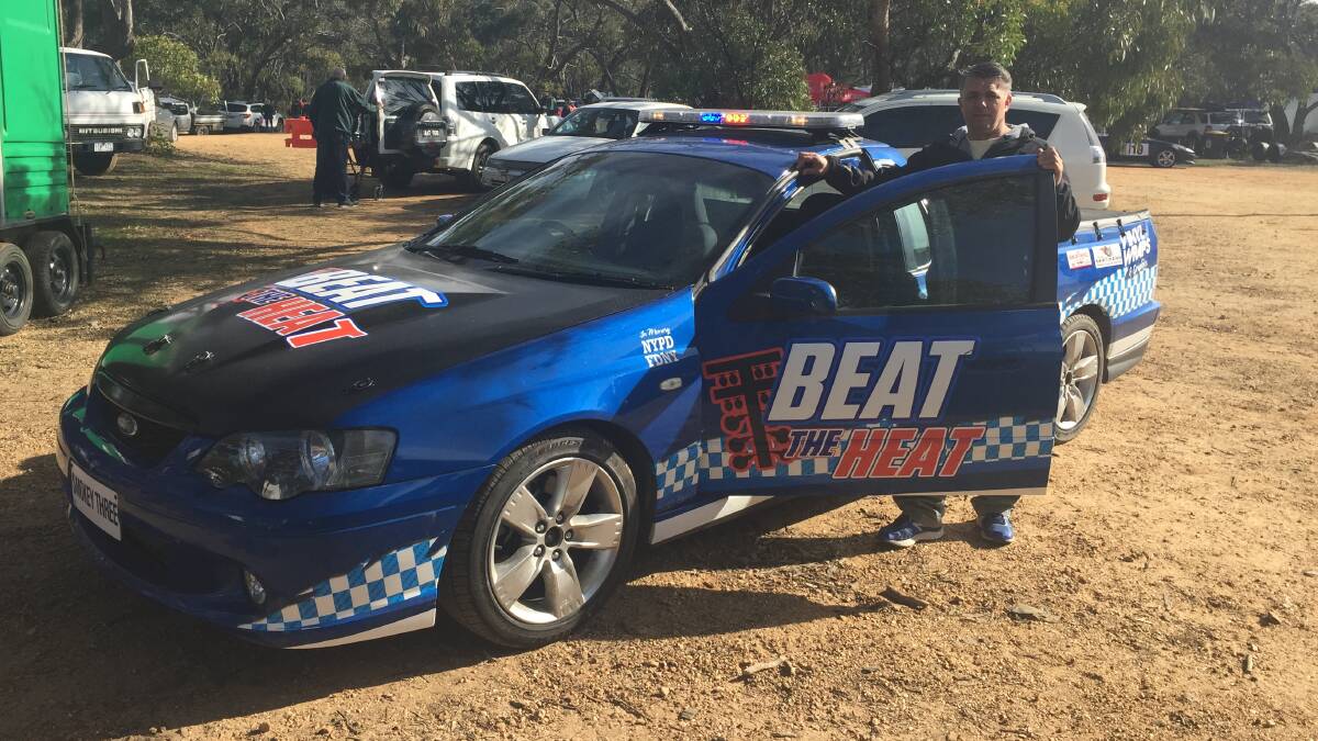 RAISING AWARENESS: Simon Borg with the Beat The Heat ute that competed at One Tree Hill on Sunday. Picture: Adam Hill