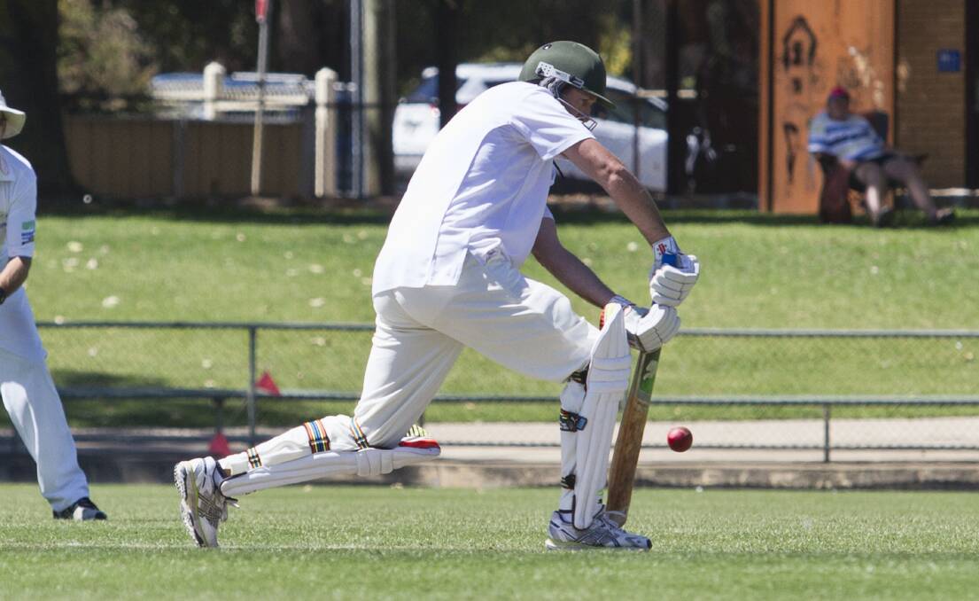 SOLID: Shaun Allen gets on the front foot for a defensive shot during the A Grade grand final. Picture: Peter Pickering