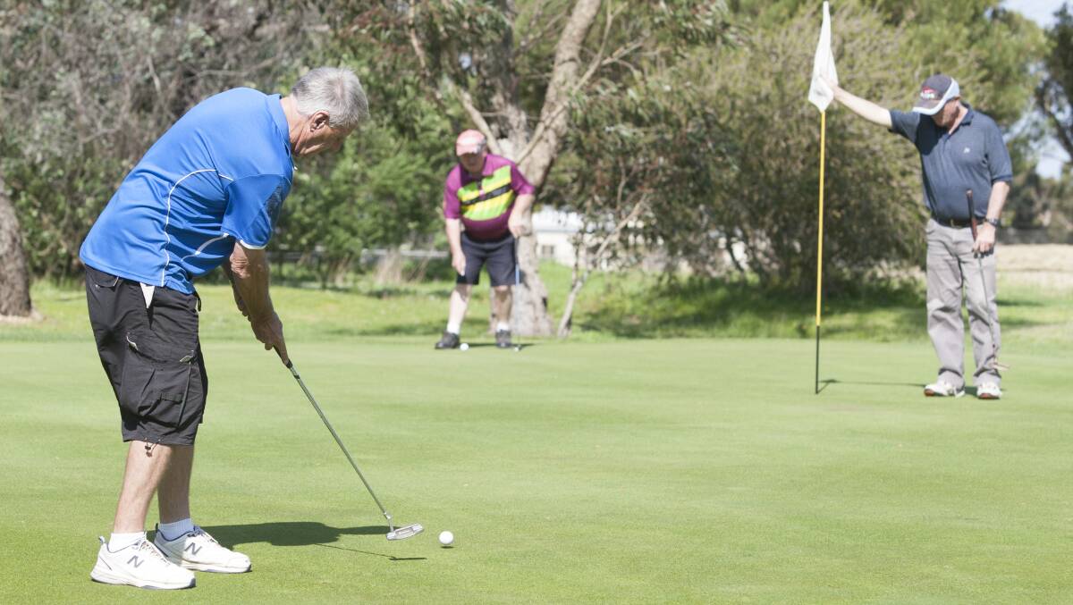 LINED UP: Neil Bryant takes his turn to putt towards the hole during a previous event at Chalambar Golf Club. Picture: Peter Pickering