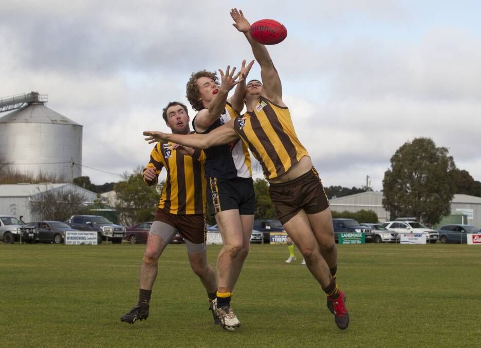 DEFENCE: Tatyoon's William McOrist spoils a marking contest against his Hawkesdale-Macarthur opponent in round eight. Picture: Peter Pickering
