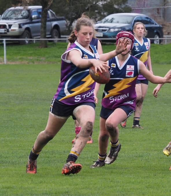 THE PERFECT STORM: Lauren Sykes kicks the ball down the ground during Ararat Storm's big win. Picture: CONTRIBUTED