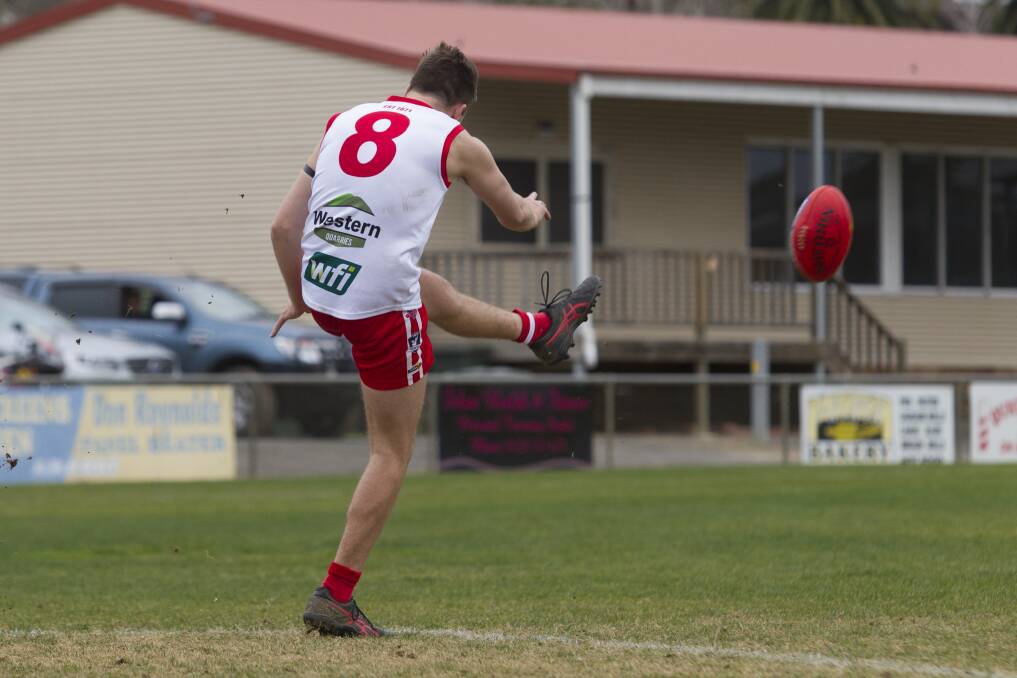 LONG BOMB: Ararat's Jacob Bates sends the ball the Rats way against Warrack Eagles earlier in the season. Picture: Peter Pickering