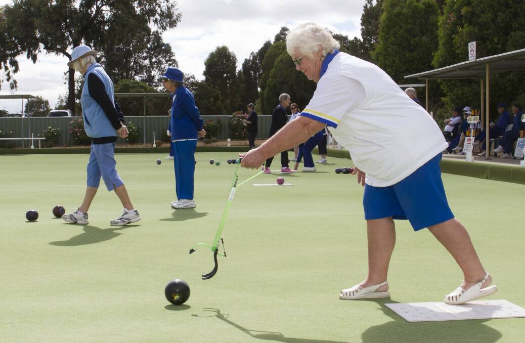 RELEASE: Stawell's Marlene Scanleton plays her shot during one of the Grampians Bowls Division midweek semi-finals last week. Pictures: Peter Pickering