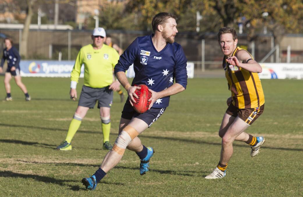 CLEAR SPACE: Ararat Eagle Andrew Beckwith looks for an option against Tatyoon in the Eagles' round 12 match. Picture: Peter Pickering