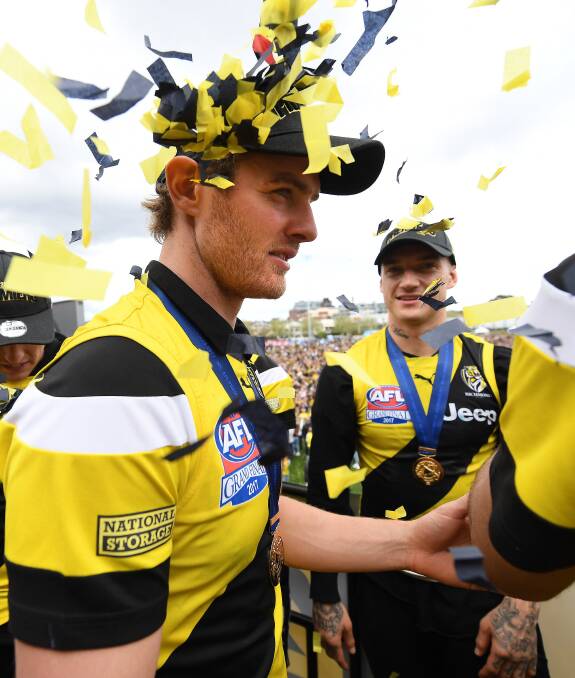 TIGER TIME: David Astbury and Dustin Martin on stage during the club's family day at Punt Road Oval. Picture: Julian Smith/AAP. 