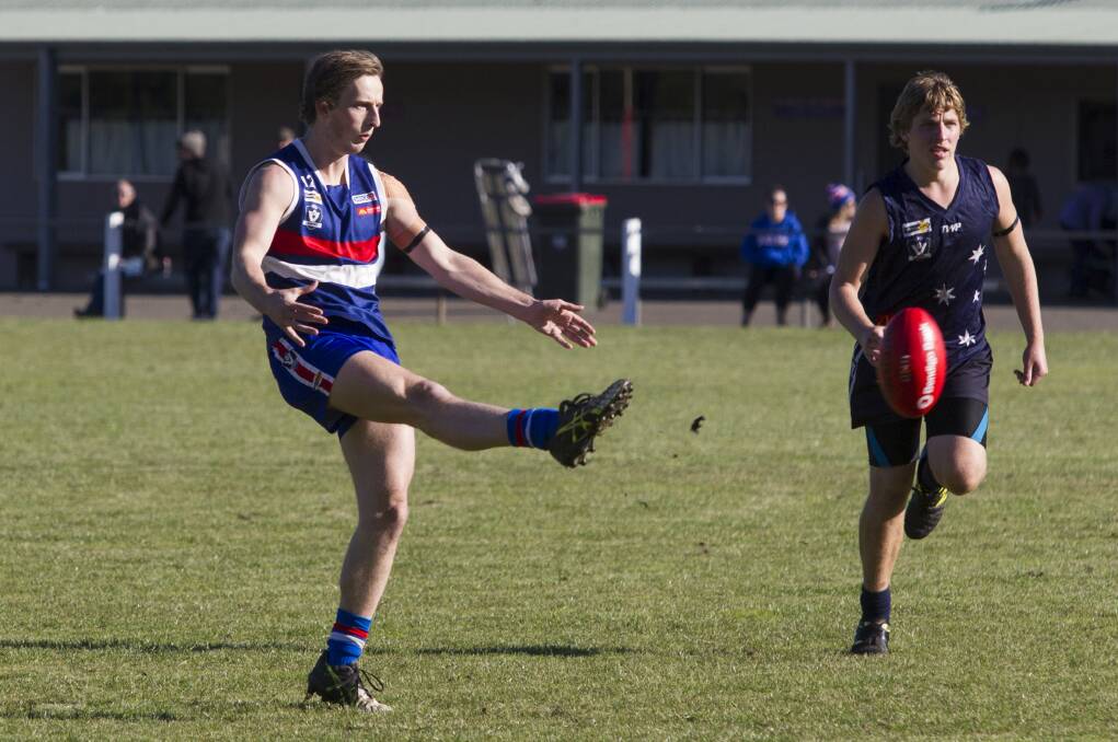 SMW Rovers' Tom Thewlis gets the ball forward against the Ararat Eagles earlier in the season. Picture: Peter Pickering