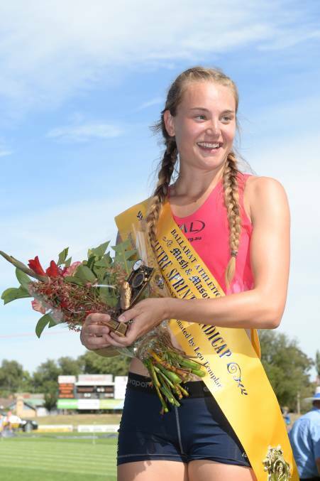 WINNER: Sarah Blizzard with her open 70m sash. Picture: Kate Healy