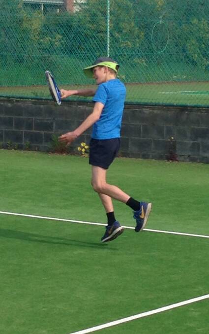 Sam Phillips shows off his forehand return.
