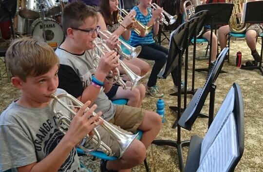 IN SYNC: Walter Pope, Lachie Meehan and Jacob Pearce playing the cornet during band rehearsals in Ararat last week. 