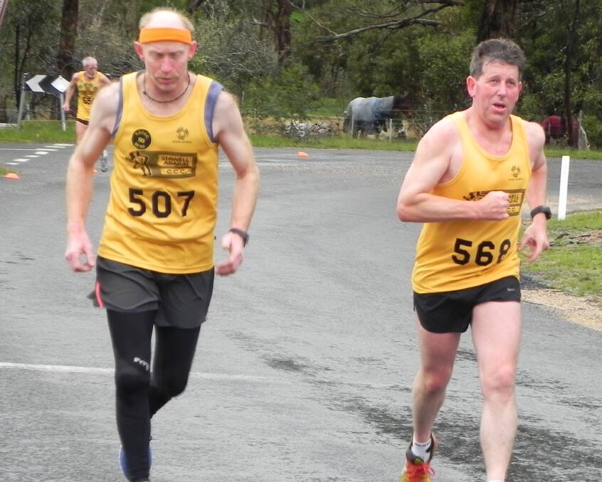 WINNER: Ian McCready looks relaxed alongside Peter Gibson in the Stawell and Ararat Cross Country Club event at One Tree Hill on Sunday.