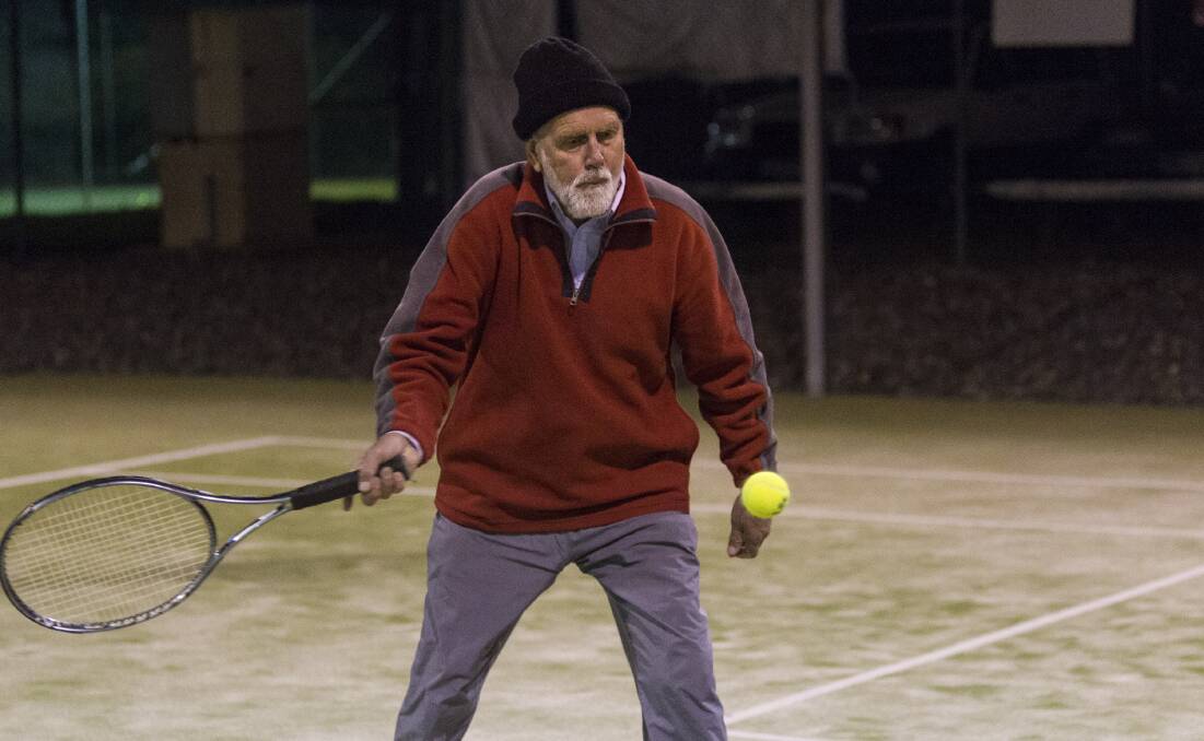 Hot shot: Rick Thomas was on the courts of the Ararat City Tennis Club on Wednesday night, returning to play after they were washed out last week. Picture: Peter Pickering. 