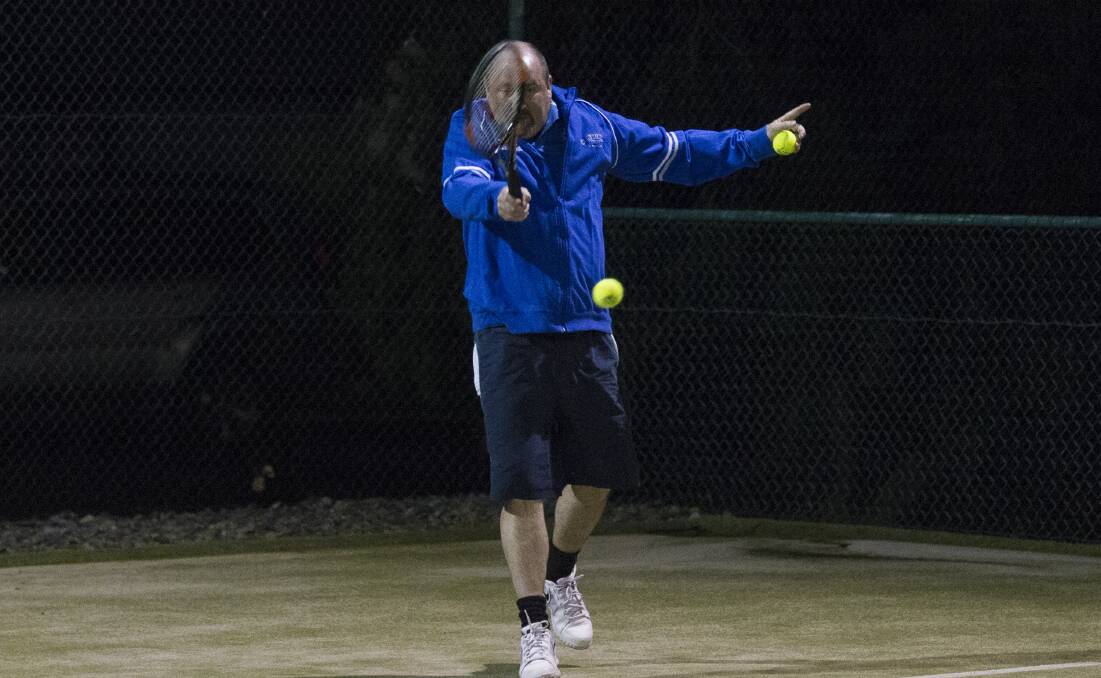 Focus: Marcus Matthews strutting his stuff on the courts of the Ararat City Tennis Club on Wednesday night, returning to play after they were washed out last week. Picture: Peter Pickering. Steve Jardine